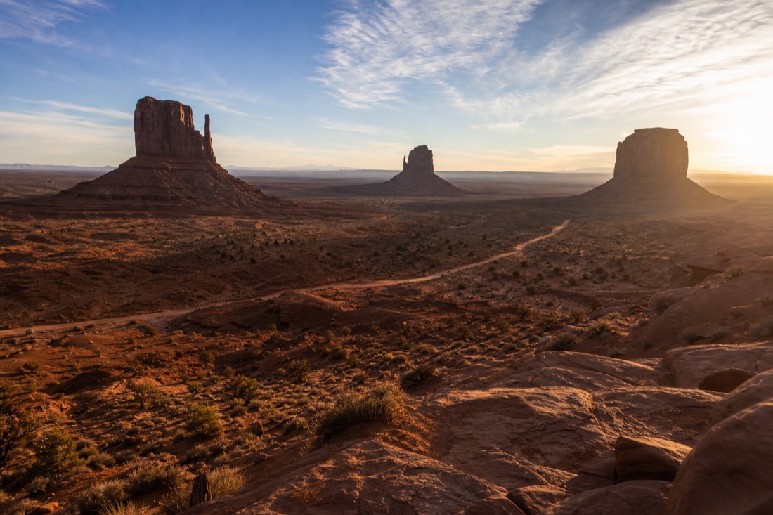 Low winter afternoon sun casting long shadows from the Mitten Buttes as the light fades early