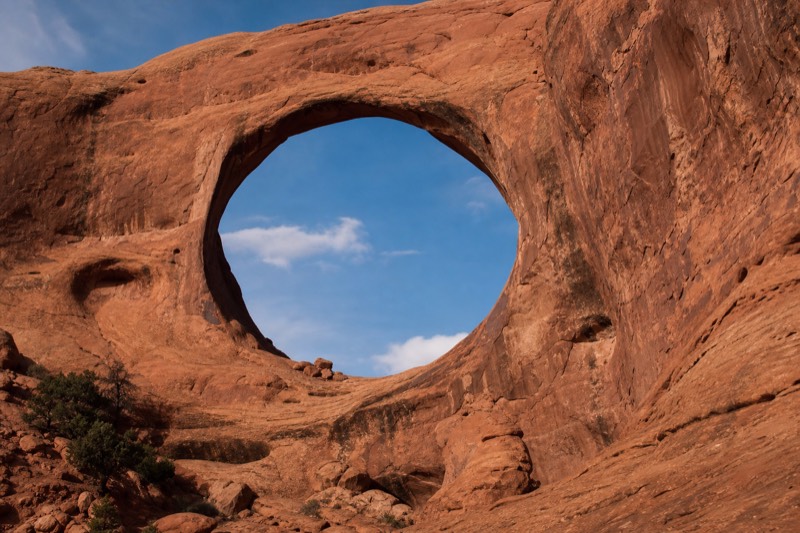 Ear of the Wind arch in the Monument Valley backcountry, reachable only with a Navajo guide